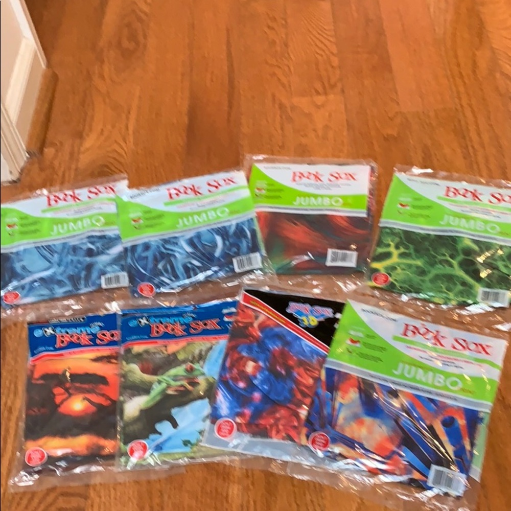 Set of 8 jumbo book Sox stretchable book covers.